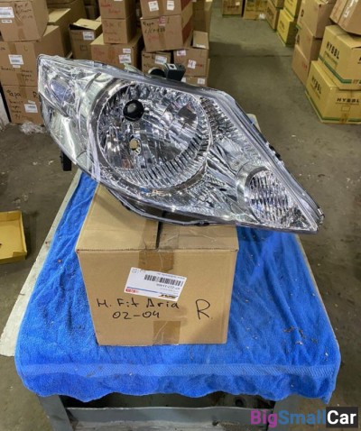 Фара правая Хонда Фит Ария Honda Fit Aria - купить Алябьево