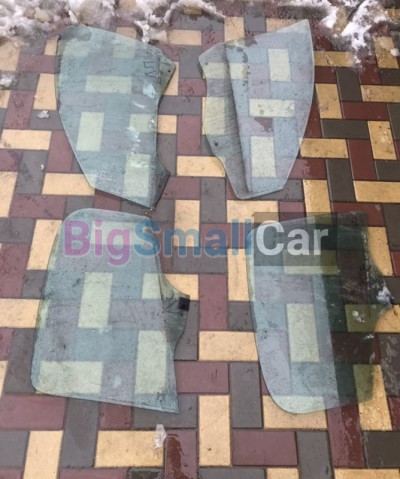 Стекло двери Peugeot 206 1.4